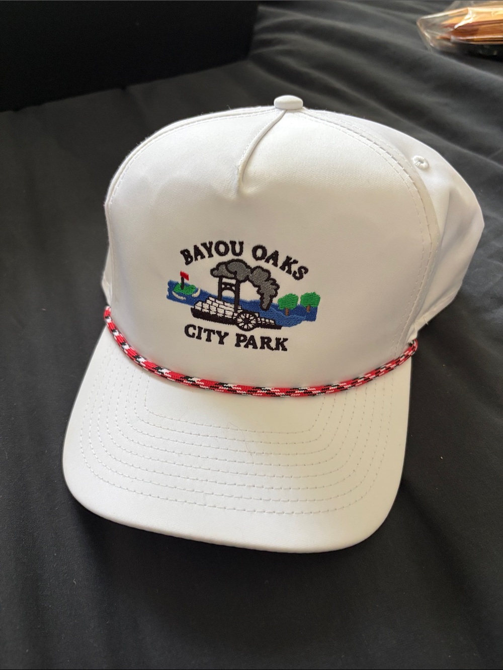 Bayou Oaks City Park White Baseball Cap with Red Accent Rope